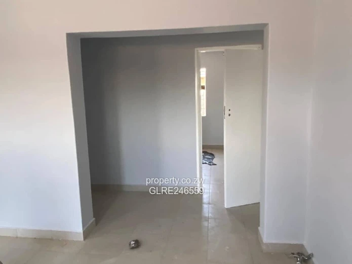 For Sale 4-Bed 2 Apartments Townhouse Complex in Budiriro Cabs  - Walled, Paved, Fitted Kitchens