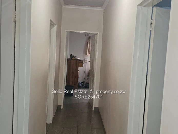 Reigate 3BR Brick Home with Borehole & Checkerboard Courtyard