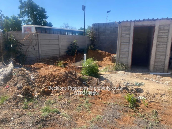 Spacious 2,420m² Walled Industrial Yard with Workshop — Bulawayo CBD