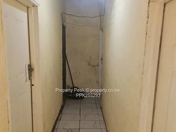 11-Bedroom Brick Home in Mbare — Walled, Main Road Deeds available