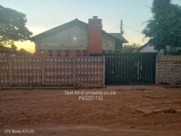 4-Bed Zengeza House — Walled, Gated with Brick Chimney