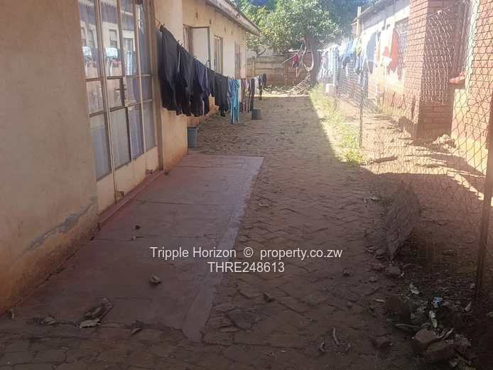 Kuwadzana phase 3, 4-Bed, 2-Bath House on Quiet Dirt Street — Borehole