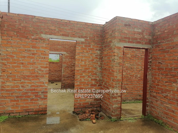 4-Bed Reigate Brick Shell on Main Road