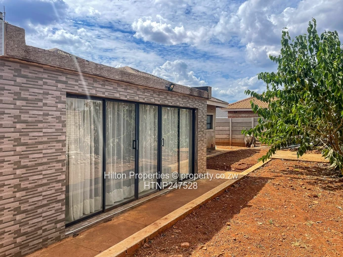 Spacious 4-Bed Home with Solar & Garage in Haydon Park