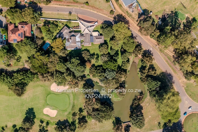 On 1 Acre Overlooking dam and Third Green in this Elite Golf Estate 