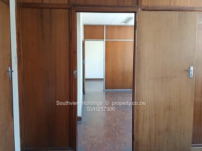 3 neat interconnecting offices plus strong room to let. 