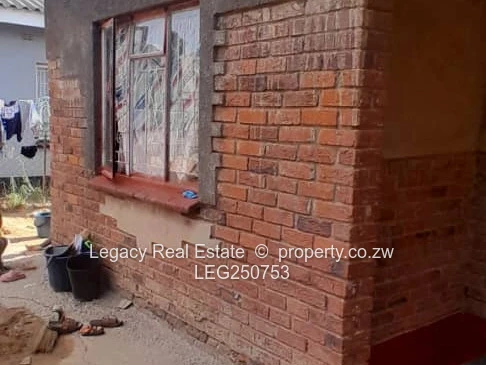 Brick 4-Bed Home with Verandah & Walled Yard
