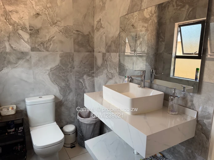 2100sqm Arlington stand with modern 2 bed cottage,gated community with clean title deed (Sole Mandate)