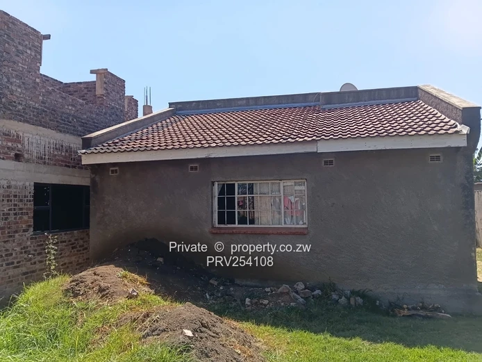 5-Bed Home with Brick Wall & Metal Gate in Pomona
