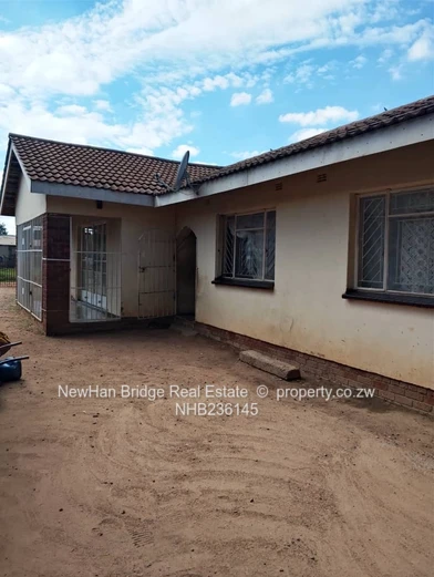 Norton 4-Bed Home with Gated Yard & Mango Trees