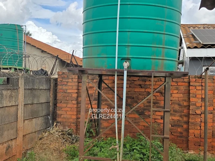 Tiled 2-Bed Kuwadzana Home — Borehole & Parking