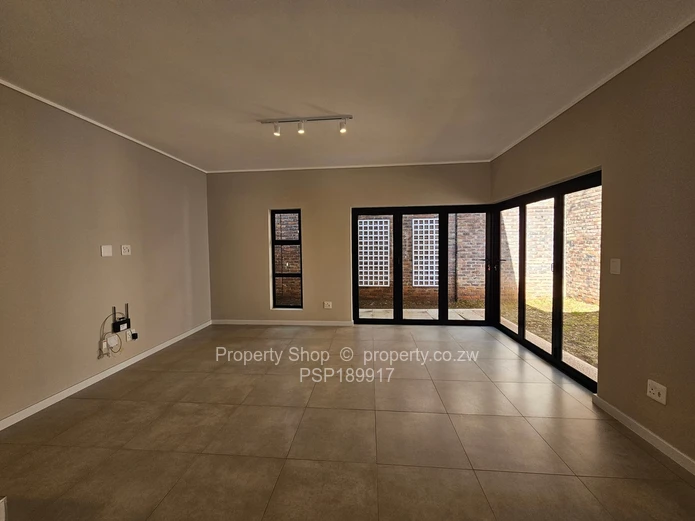 Invest in South African Property! Beautiful duplex in Sandton. Spacious, Modern and Secure.