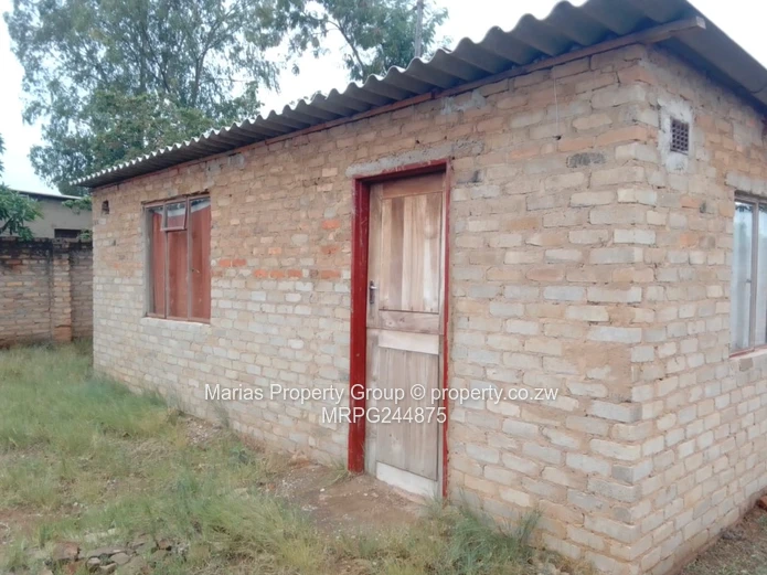 Walled 6-Bed Shell on 2.03ha — Main Road Frontage