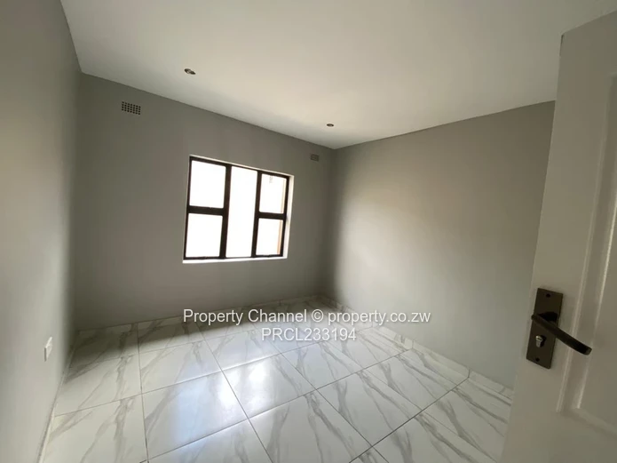 Modern 1-Bed Flat in Pomona, Harare North — Borehole