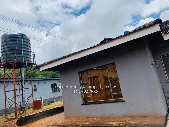 Brick-accented 3-Bed Concession Home with Borehole