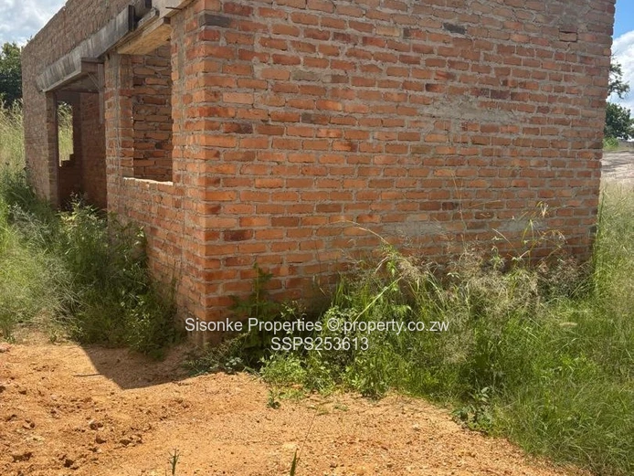 Incomplete brick retail shell on 300m² in  Murehwa