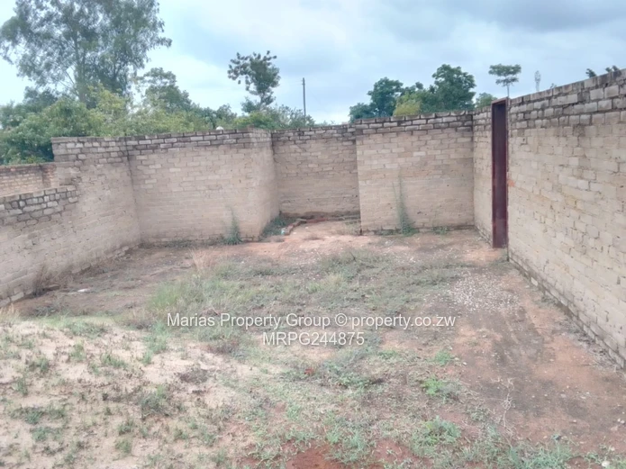 Walled 6-Bed Shell on 2.03ha — Main Road Frontage