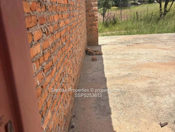 Incomplete brick retail shell on 300m² in  Murehwa