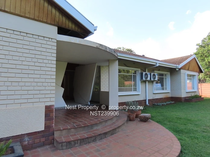 Neat, Embassy Style Home located in the heart of Gunhill!