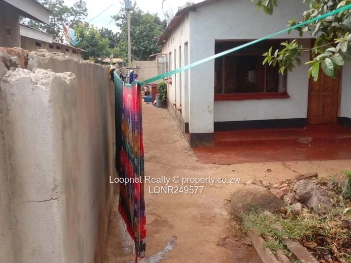 Dzivarasekwa 3-Bed Home with Red Gate, Verandah & Garden