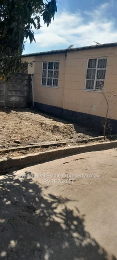 2-Bed Tiled Home with Walled Yard & Access Control