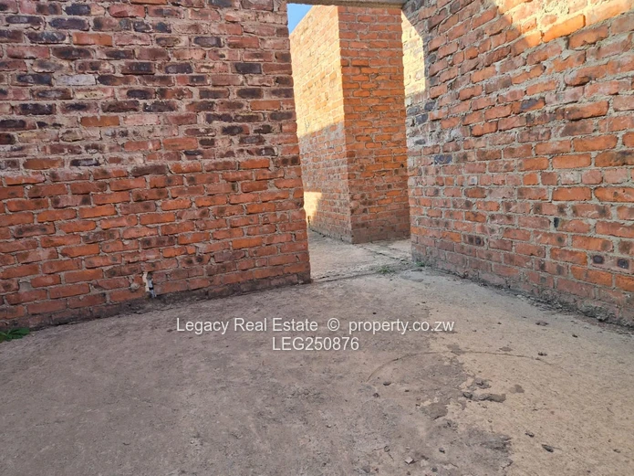 Prime 2,000sqm Stand with Incomplete Modern Home – Masotsha Ndhlovu