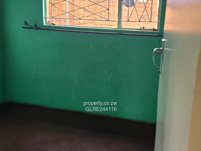 Tiled 2-Bed Kuwadzana Home — Borehole & Parking