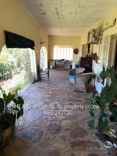 A Brick Under Tile Home In Binga
