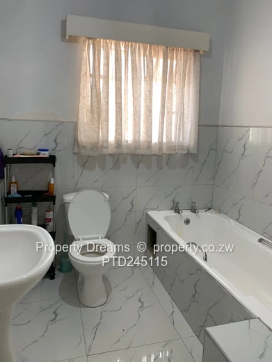 Harare CBD 2-Bed Garden Flat — Updated Kitchen & Borehole