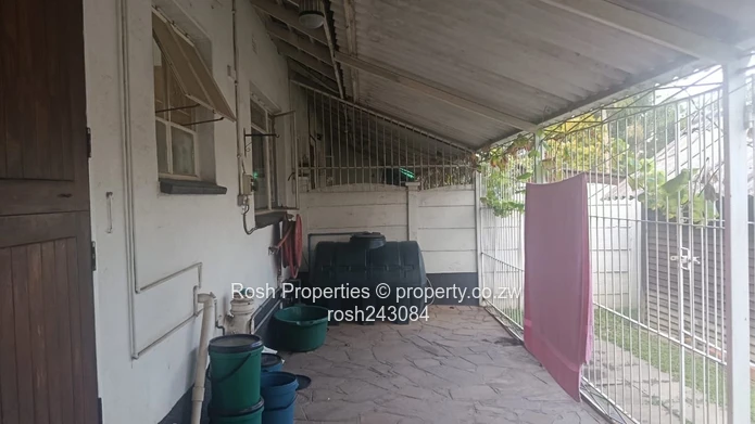 Avondale 2-Bed Garden Flat — Verandah & Borehole