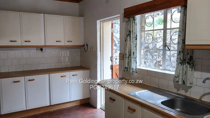 Stone-Clad Family Home With Cottage For Sale In Chimanimani
