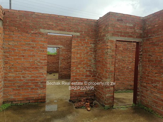 4-Bed Reigate Brick Shell on Main Road