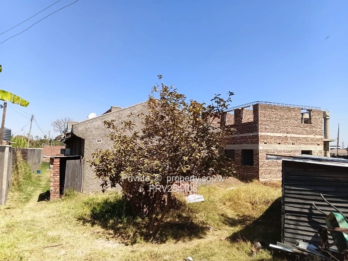 5-Bed Home with Brick Wall & Metal Gate in Pomona