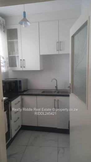 Bright 2-Bed Avenues Flat (Harare CBD) with spacious balcony that can be converted to a 3rd bedroom