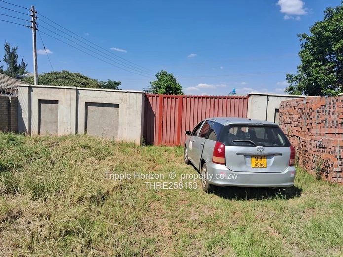 Fenced 2000m² Mandara Plot — Main Road Frontage