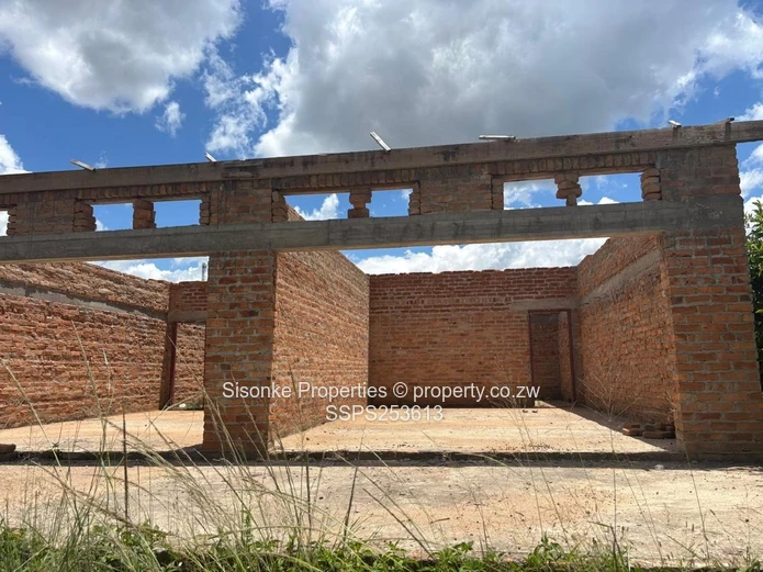 Incomplete brick retail shell on 300m² in  Murehwa