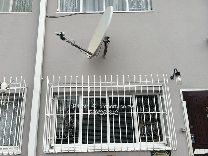 Kensington 2-Bed Flat 40m2 — Borehole & Secure Garden