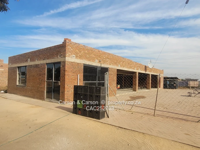 A single storey commercial building strategically lacated in the heart of Mabvuku