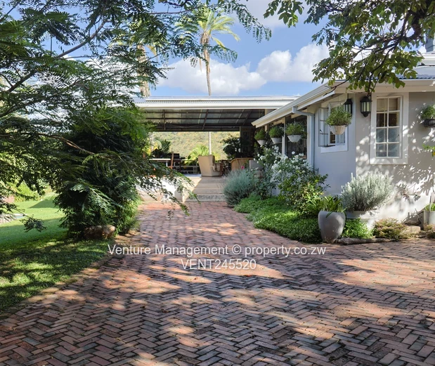 Elegant Estate Living on Expansive Grounds – Umwinsidale