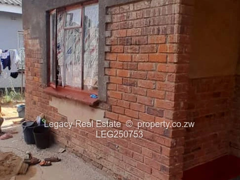 Brick 4-Bed Home with Verandah & Walled Yard