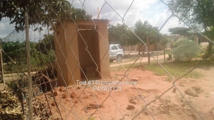 Unfinished 2-Bed Home with Fenced Yard in Chitungwiza