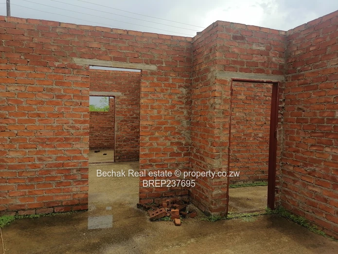 4-Bed Reigate Brick Shell on Main Road