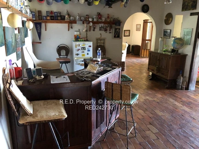 A Brick Under Tile Home In Binga