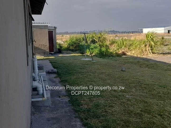 Neat 2-Bed Tiled Home on 1300m² with Staff Quarters