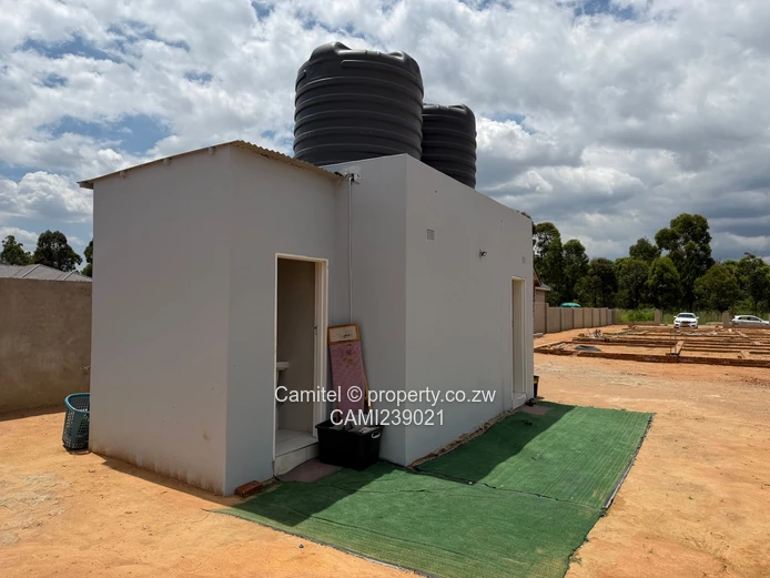 2100sqm Arlington stand with modern 2 bed cottage,gated community with clean title deed (Sole Mandate)