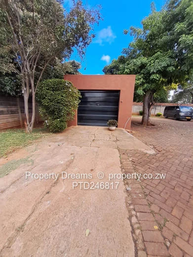 4-Bed Hillside Home on 1,237m² with Borehole & Garage