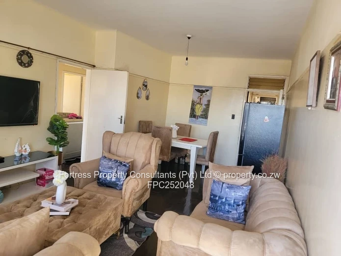 Sunlit 2-Bed Flat in Avenues CBD — Borehole (Sole Mandate)