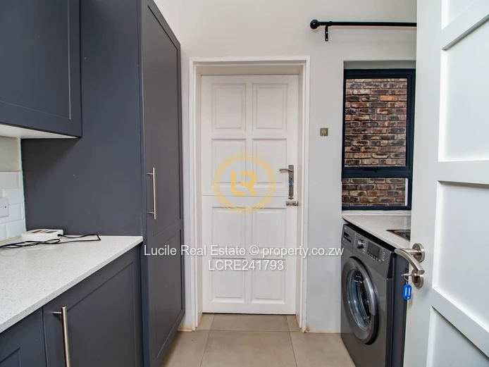 Seamless Living: A Cozy Indoor-Outdoor Retreat in Borrowdale