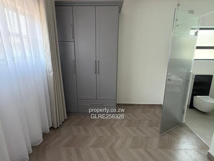 Modern 4-Bed, 5-Bath Flat with Borehole in Vainona