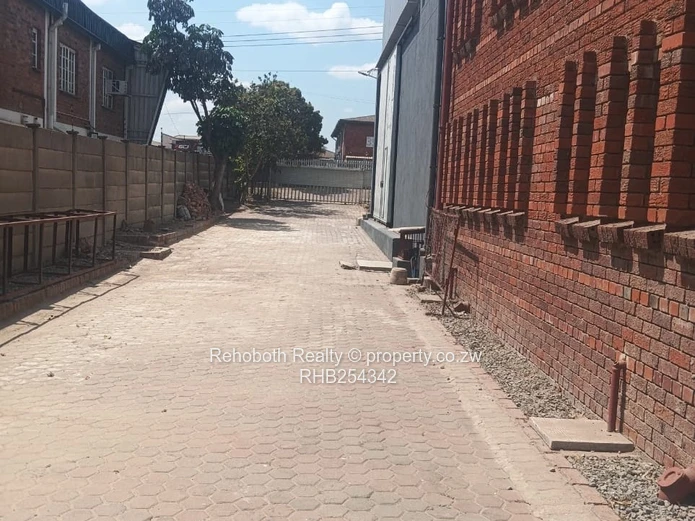 Graniteside Brick Warehouse 700m² on 3500m² — Borehole & Mezzanine